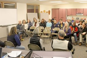 Evan Thompson / The Record &mdash; Parents, teachers and community members listen to the South Whidbey School Board as they discuss the closure of Langley Middle School at a workshop on Jan. 11. The board will vote whether or not to the close the historic school at 6:30 p.m. on Jan. 25 at South Whidbey Elementary School.