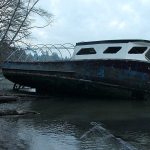 Boat adrift in Puget Sound since December lands at Brighton Beach