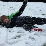 Kids swap books for boards, sleds and skis after Monday snowfall