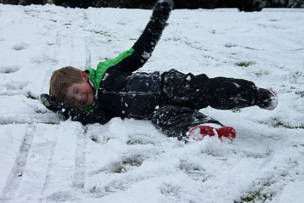 Kids swap books for boards, sleds and skis after Monday snowfall