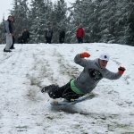 Kids swap books for boards, sleds and skis after Monday snowfall