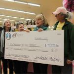 Kyle Jensen / The Record &mdash; Goosefoot Community Fund Executive Director Sandy Whiting (third from right) presents South Whidbey School District officials with a check for $73.575.36. Left to right: (???), Linda Racicot, Joe Moccia, Sandy Whiting, Cary Peterson and Marian Myszkowski.