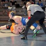 Melissa Newman photo &mdash; South Whidbey senior Chase Barthlett attempts to pin his opponent from Granite Falls on Senior Night at Erickson Gymnasium on Jan. 11.