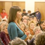 Evan Thompson / The Record                                Sumer Eberhart, a Langley resident, speaks to panelists at Thursday night&rsquo;s educational community meeting on Langley becoming a sanctuary city.