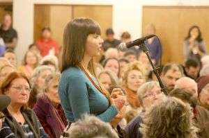 Evan Thompson / The Record                                Sumer Eberhart, a Langley resident, speaks to panelists at Thursday night&rsquo;s educational community meeting on Langley becoming a sanctuary city.