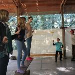 Kyle Jensen / The Record &mdash; During circus class, a group of girls spin poi on a teeter totter while a group of boys practice their spinning plate skills.