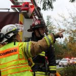 Record file &mdash; Deputy Chief Wendy Moffatt gives order to Central Whidbey Fire & Rescue Captain Jerry Helm during a fire this past November.