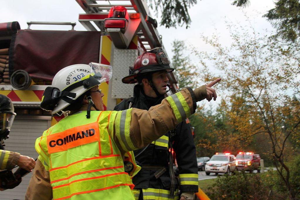Record file &mdash; Deputy Chief Wendy Moffatt gives order to Central Whidbey Fire & Rescue Captain Jerry Helm during a fire this past November.