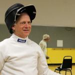 Kyle Jensen / The Record &mdash; Bob Tearse takes a breather before having a bout with Kleinman to wrap up the fencing session.