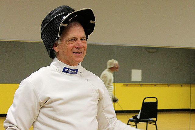 Kyle Jensen / The Record &mdash; Bob Tearse takes a breather before having a bout with Kleinman to wrap up the fencing session.