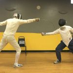 Kyle Jensen / The Record &mdash; Joseph Kleinman (left) beats Bob Tearse (right) to the point while sparring in epee.