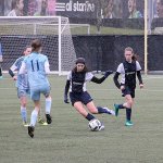 Contributed photo                                South Whidbey&rsquo;s Kelly Murnane dribbles between two Bainbridge Island players with Liz Haines ready to assist. South Whidbey lost 2-1 in overtime in the championship match of the Washington State Youth Soccer Founders Cup on Feb. 5.