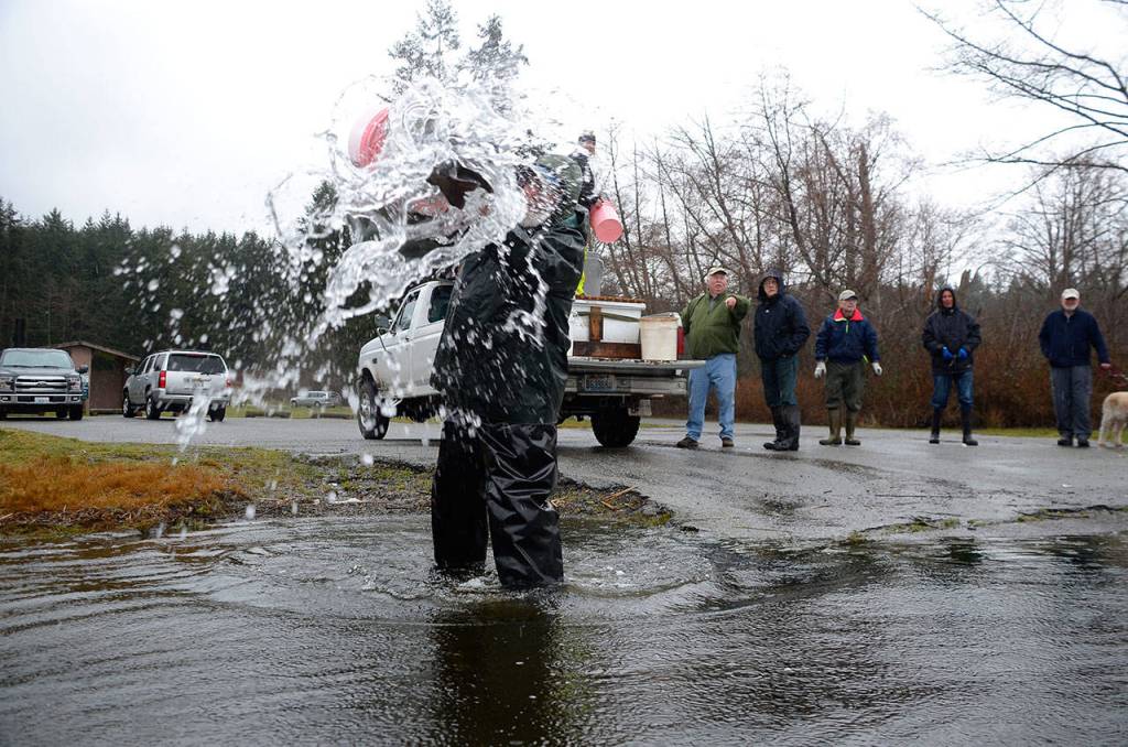 SLIDESHOW | Lone Lake swimming with rainbows; fly clubs dump 500 pounds of trout into ‘regional’ fishing hole