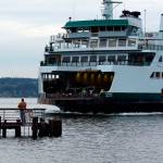 Record file &mdash; The Washington State Ferry Tokitae pulls into Mukilteo. The state transportation agency is proposing schedule changes this summer that it hopes will address long delays associated with mismatched boats that operate on the run.