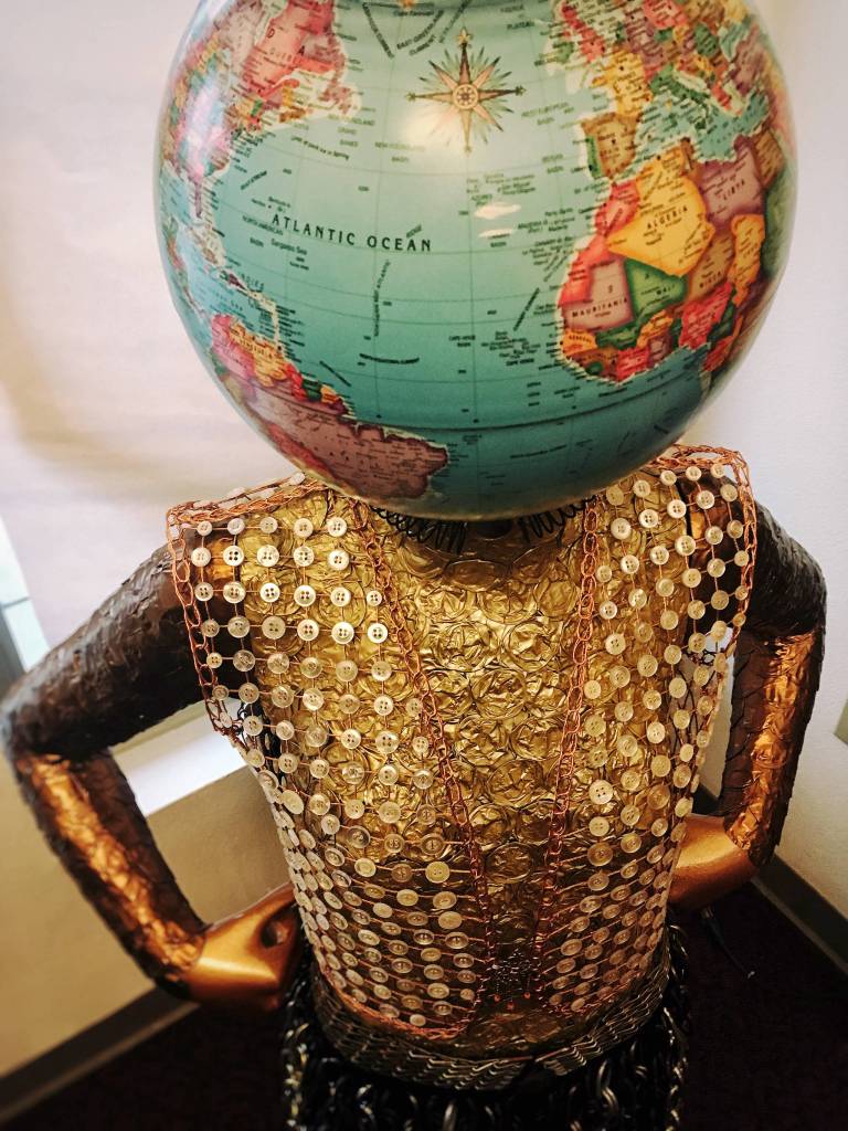 Contributed photo                                Pheifer&rsquo;s piece, &ldquo;The World on Your Shoulders,&rdquo; is made from a mannequin, an old globe, wine foils, buttons and chains.