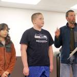 Evan Thompson / The Record &mdash; Sol Rabinovich (left) and Joshua Marks (center) were recognized by the South Whidbey School Board for finishing first and second in the Langley Middle School geography bee, respectively. Jack Terhar, a longtime middle school teacher, stands next to the students and described their work ethics. Rabinovich recently qualified for the state geography bee.