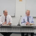 Patricia Guthrie photo &mdash; At a recent county meeting, Island County Public Health Director Keith Higman (left) and health officer Dr. Brad Thomas reviewed information from the state.