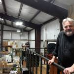 Kyle Jensen / The Record &mdash; Mukilteo Coffee Roasters co-owner Gary Smith regularly watches over the roasting operations, and built his office on a mezzanine overlooking the roasting facility.