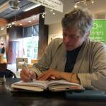 Kyle Jensen / The Record &mdash; Mary Anne Radmacher jots down thoughts at WiFire Coffee Bar, a place where she can typically be found working.