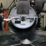 Kyle Jensen / The Record &mdash; Roaster Jake Torget operates the vintage roaster at Mukilteo Coffee Roasters.