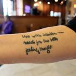 Kyle Jensen / The Record &mdash; Follower and friend Alice Johnson had excerpts from Radmacher&rsquo;s poems tattooed on her arm as daily inspiration.