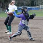 Evan Thompson / The Record &mdash; South Whidbey freshman Ari Marshall throws to first base during a practice at South Whidbey High School&rsquo;s softball field. Marshall will be the Falcons&rsquo; starting catcher this season.