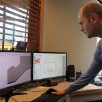 Kyle Jensen / The Record &mdash; Tim Phillips, who does design and drafting for Phillips Enterprises, shows digital blueprints of a current project. It&rsquo;s a departure from the pencil and paper once used to draw blueprints.