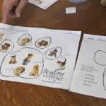 Evan Thompson / The Record &mdash; Students keep track of how many visits they&rsquo;ve had with Ruby by placing stickers on a worksheet.