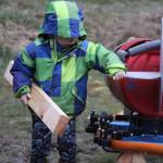 Wyatt Brazelton, 3, checks out his cart before takeoff. The two-by-four puts it in position Wednesday, March 1, 2017. Photo by Ron Newberry/Whidbey News-Times