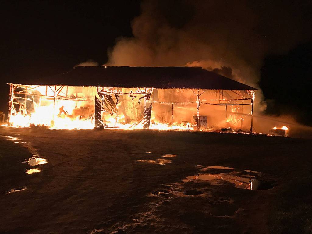 When Central Whidbey Fire & Rescue arrived on the scene, the barn was full involved in flames Monday, March 6, 2017. Photo provided by Central Whidbey Fire & Rescue