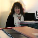 Kyle Jensen / The Record &mdash; Szabo offers vocal lessons to the young and old out of her Clinton studio.