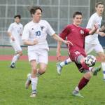 Evan Thompson / The Record &mdash; South Whidbey sophomore forward Michael Lux battles with Cedarcrest&rsquo;s Jacob Bodnar for possession of the ball during a match on Wednesday night at Waterman&rsquo;s Field.