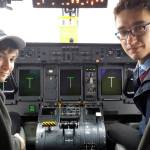 Rowen Stephens photo &mdash; Rowen Stephens prepares for flight with mentor Aaron Simpson.