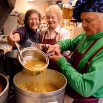 Record file &mdash; Sharon Giberson and Jean Matheny help Dan Saul mix soup early on a Tuesday morning in preparation for the day&rsquo;s lunch. Saul is leaving the soup kitchen after 14 years.
