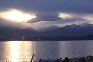 A look out over Admiralty Inlet on the west side of Whidbey Island on a gloomy January 2017 late afternoon reveals a peek at the Olympic mountains, the source of the area&rsquo;s rain shadow. Photo by Ron Newberry/Whidbey News-Times.