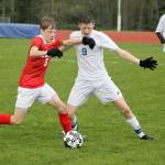 Evan Thompson / The Record &mdash; Falcon junior midfielder Ari Rohan battles for possession against King&rsquo;s senior Riley Richards on April 14.