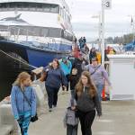Evan Thompson / The Record &mdash; Passengers disembark from San Juan Clipper at South Whidbey Harbor on April 1. Around 200 people spent the next two hours in Langley shopping, eating and exploring downtown.