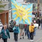 Hundreds participate in climate march through streets of Langley