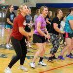 Evan Thompson / The Record &mdash; South Whidbey girls tennis players spent part of Monday&rsquo;s practice inside loosening up to the rhythm dance game &ldquo;Just Dance&rdquo; for 30 minutes due to rainwater on the courts.