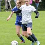 Contributed photo &mdash; South Whidbey Reign&rsquo;s Mallory Drye maneuvers with the soccer ball during the Washington Youth Soccer President&rsquo;s Cup.