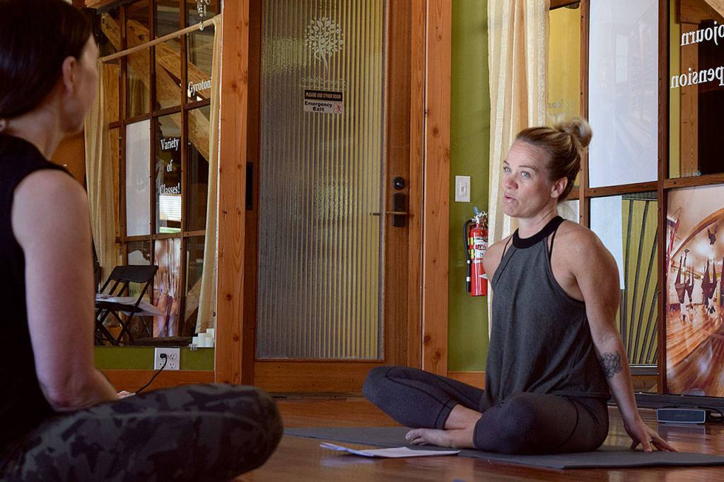 Kyle Jensen / The Record &mdash; Lovely opens the floor in between poses to discussion.