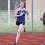 Matt Simms photo &mdash; South Whidbey junior Elizabeth Donnelly won the 800-meter Cascade Conference title for the third consecutive time at the league championships on May 5 at Cedarcrest High School.
