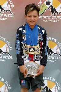 Fifth-grade wrestler from South Whidbey earns third state title