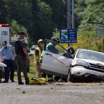 Kyle Jensen / The Record &mdash; Responders work to extricate Jedlicka from the vehicle.