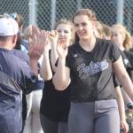 Evan Thompson / The Record &mdash; South Whidbey junior Mackenzee Collins and her teammates high five their opponents from Sultan after a 5-2 win over the Turks on May 3.