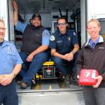 Jessie Stensland / Whidbey News Group                                From left to right are Gregory Behan, an EMT with WhidbeyHealth, Scott Jackson, a paramedic with the hospital, South Whidbey firefighter and Coupeville teacher Jon Gabelein and Capt. Jerry Helm with Coupeville Fire & Rescue.