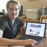 Evan Thompson / The Record &mdash; Avrey Scharwat displays the Historic Langley website on his laptop computer. Scharwat designed the website as part of an Eagle Scout project.