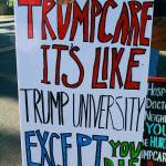 Clinton resident Malcolm Cummings displays a sign meant to spread awareness of the potential consequences of Trumpcare as part of a protest vigil Tuesday in Coupeville. Photo by Daniel Warn/Whidbey News Group