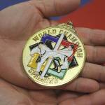 Evan Thompson / The Record &mdash; Jeffrey Chia displays his gold medal from the American Taekwondo Association World Championships.