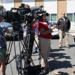 Washington State Trooper Heather Axtman speaks with TV reporters about an officer-involved shooting in Oak Harbor. Oak Harbor Police Chief Kevin Dresker is in the background.